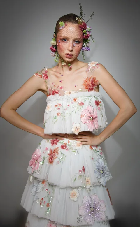 Karolina Juza — flowers and a net veil